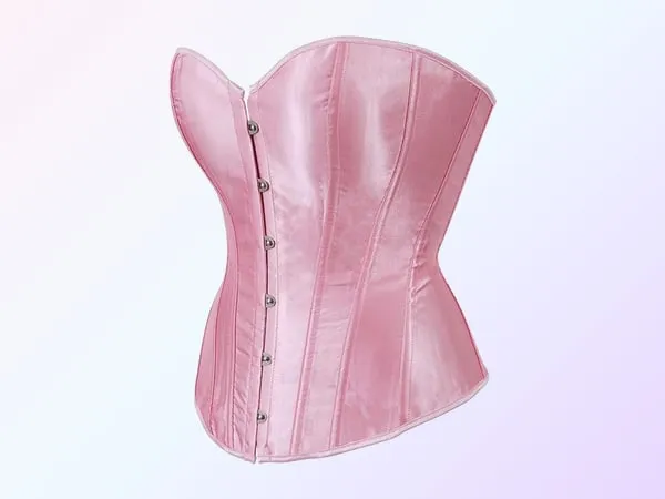 A pale pink satin overbust corset shown from the front at an angle, boned panels and a row of silver clasps down the front, on a soft pink and lavender gradient.